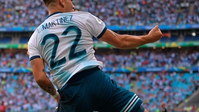 Argentina's Lautaro Martinez celebrates after scoring against Qatar. AFP