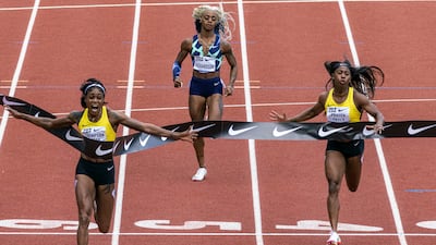 Jamaica's Elaine Thompson-Herah, left, wins the 100m at the at the Eugene Diamond League meeting at the Prefontaine Classic track in Oregon, USA, on Saturday, August 21. AP