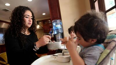 Diabetes sufferer Noor Al Ramahi, 28, with her sons Rakan and Kareem, admits to a lifelong struggle for health and recognises the problems the condition exacerbated. She says she has an understanding of diabetes that comes with maturity. Sammy Dallal for The National