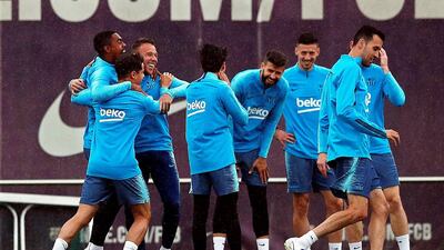 Barcelona's players were in a relaxed mood in training. EPA
