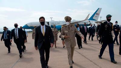 US Defense Secretary Mark Esper, centre left, walks with Secretary General of the Ministry of National Defence, Maj Gen Abdelhamid Ghriss upon arrival in Algiers, Algeria. AFP