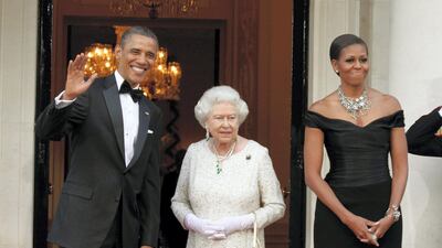Queen Elizabeth stands with US President Barack Obama and First Lady Michelle Obama during their visit to the UK in 2011. Getty Images