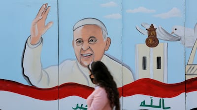 A mural of Pope Francis on the wall of a Baghdad church before his historic visit to Iraq in 2021. Reuters