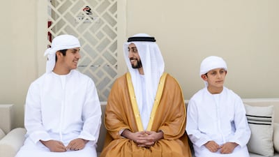 Sheikh Mohamed bin Mansour bin Zayed (L) and Sheikh Hamdan bin Mansour bin Zayed attend the group wedding reception.