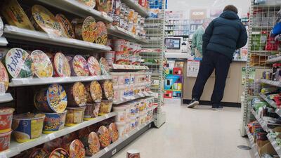 Cup noodles are seen on the floor of a convenience in Sendai on February 13, 2021 after a strong 7.1-magnitude earthquake struck late off the eastern coast of Japan. AFP