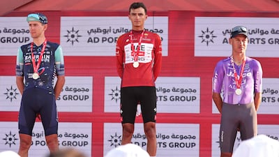 Podium one, two, three: Champion and UAE Team Emirates rider Isaac del Toro, centre, with second place Bahrain Victorious Italian rider Antonio Tiberi, left, and third place Team Jayco Alula's Australian rider Lucas Plapp. AFP