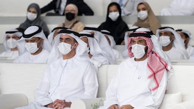 Sheikh Nahyan bin Zayed, chairman of the board of trustees of Zayed bin Sultan Al Nahyan Charitable and Humanitarian Foundation (R), and Sheikh Saif bin Zayed, Deputy Prime Minister and Minister of Interior, attend a lecture at Majlis Mohamed bin Zayed.