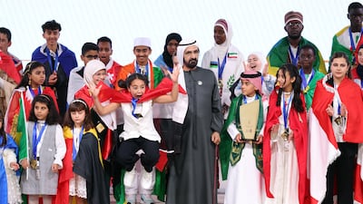 Arab Reading Challenge winner Mayar Mohammed, 11, from Egypt, jumps for joy at the closing ceremony in Dubai. The challenge was launched in 2015 by Sheikh Mohammed bin Rashid, Vice President and Ruler of Dubai. Chris Whiteoak / The National