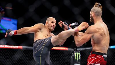 Glover Teixeira attempts to kick Jiri Prochazka during their fight at UFC 275. Getty