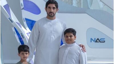 Sheikh Hamdan bin Mohammed, Crown Prince of Dubai, meets young fan Abdullah Hussain (right) and his brother.