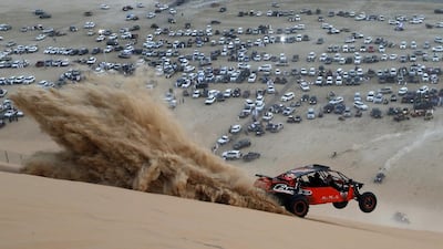 A dune buggy driver trains before competing in a sand dune drag race. Karim Sahinb / AFP Photo