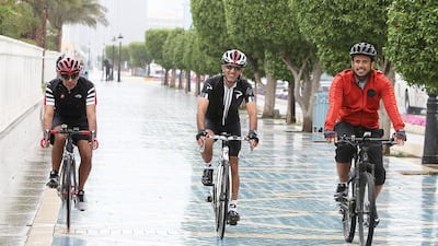 Sheikh Sultan bin Tahnoon, right, chairman of the Department of Transport, Dr Mugheer Al Khaili, centre, chairman of the Health Authority Abu Dhabi and director general of Abu Dhabi Education Council, and Ali bin Harmal Al Dhaheri, managing director of Adnec, were quick off the mark at Abu Dhabi Corniche to promote The National’s Cycle To Work Campaign, #cycletoworkuae. Pawan Singh / The National