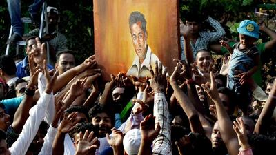 Fans celebrate Indian Bollywood actor Salman Khan at his home at Galaxy apartments after getting bail from his ongoing trial of a hit and run case, in Mumbai. AFP