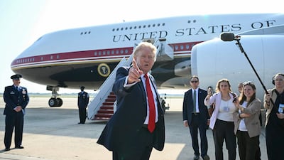 US President Donald Trump speaks to the press before he boards Air Force One for his first flight aboard the Boeing 747-8 that Qatar gifted the United States to use for executive travel, at Joint Base Andrews, in Maryland, on Wednesday. AFP