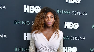 Serena Williams, in a white Tom Ford dress with sequinned sleeves, attends the premiere of 'Being Serena' at Time Warner Centre on April 25, 2018 in New York City. AFP