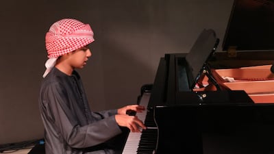Ahmed Al Mousawi, 12, is autistic and has an award-winning talent for playing the piano. All photos: Al Mousawi family