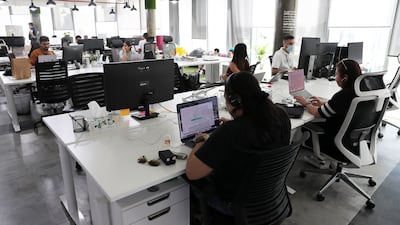 The Gallup study found 29 per cent of employees were engaged at work in the UAE. Pawan Singh / The National