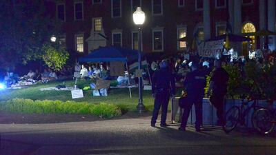 Police move to bring down an encampment after several days of protests by pro-Palestinian activists on the Virginia Tech campus. AP
