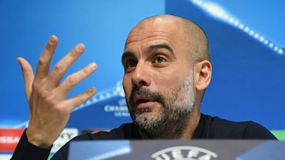 Pep Guardiola speaks to the media ahead of Manchester City's Uefa Champions League last 16 second leg against Basel on Wednesday. Oli Scarff / AFP