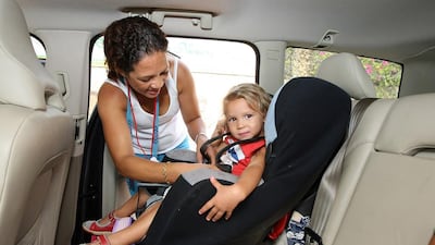 A properly fitted car seat and save a child's life. Pawan Singh / The National