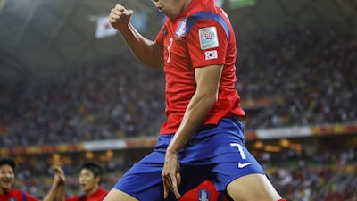South Korea's Son Heung-min celebrates one of his two goals in his team's 2-0 Asian Cup quarter-final win over Uzbekistan on Thursday in Melbourne. Brandon Malone / Reuters / January 22, 2015