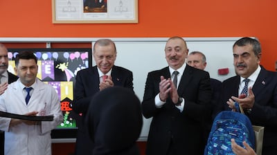Turkey’s President Recep Tayyip Erdogan, left, and Azerbaijani President Ilham Aliyev visiting a primary school in Kahramanmaras, Turkey, in June 2025. Getty Images