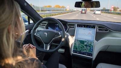 The interior of a Tesla Model S electric car, equipped with Autopilot hardware and software. Getty Images