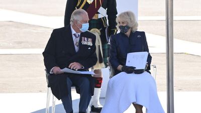 Britain's Prince Charles, Prince of Wales and Britain's Camilla, Duchess of Cornwall attend a Independence Day Military Parade at Syntagma Square in Athens on March 25, 2021, as Greece celebrates 200th anniversary of 1821 revolution and war of independence. / AFP / ARIS MESSINIS
