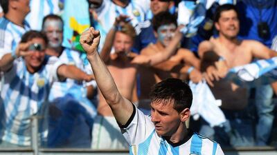Lionel Messi raises his fist in the air after scoring the winner for Argentina on Saturday against Iran at the 2014 World Cup in Belo Horizonte, Brazil. Peter Powell / EPA / June 21, 2014