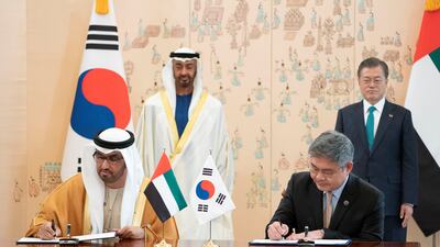 In Seoul in February 2019, President Sheikh Mohamed and Moon Jae-in, President of South Korea, witness the signature of a deal between Adnoc and SKEC to build the world's largest crude oil storage facility in Fujairah. Dr Sultan Al Jaber, Adnoc managing director and chief executive, and a Korean representative of SKEC sign the papers. Ministry of Presidential Affairs