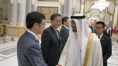 Sheikh Mohamed is introduced to the Chinese delegation.