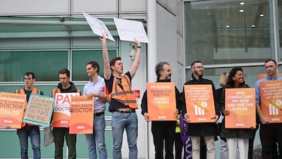 NHS workers at a picket line outside University College Hospital, central London. AFP
