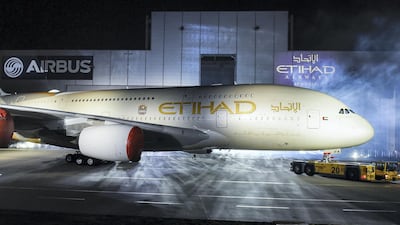 In its 10th year, Etihad carries a record 10 million passengers. Here, an Airbus A380-800 rolls out of a hangar in Hamburg. Reuters
