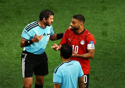 Egypt captain Mohamed Salah talks to referee Omar Al Ali following New Zealand's goal. Reuters