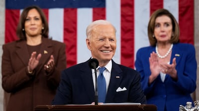 President Joe Biden delivers the 2022 State of the Union address flanked by Vice President Kamala Harris and former House speaker Nancy Pelosi. Reuters