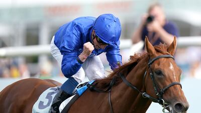 William Buick pumps his fist in celebration after guising Hurriance Lane to victory in the St Leger at Doncaster Racecourse. PA