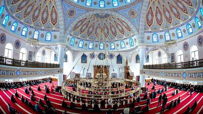 Believers of the Community of the Turkish-Islamic Union in Germany (DITIP) arrive to pray at the Merkez mosque in Duisburg, Germany. EPA