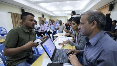 After waiting for hours tickets are handed out at St. Mary's Catholic Church. Leslie Pableo for The National