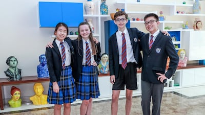 Brighton College pupils are taking up the Mandarin language. (L-R) Suah Yang, 14, Hollie Wilson, 13, Alex Ure, 13 and Arvin Egli, 13. Victor Besa / The National