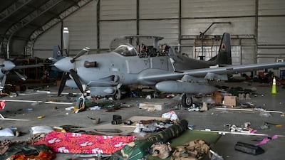An Afghan Air Force A-29 attack aircraft inside a hangar at the airport in Kabul on August 31, 2021, after the US pulled all its troops out of the country. AFP