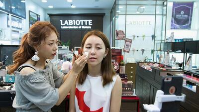 Chinese beauty blogger Yu Xiaoxiao on a K-beauty show in Seoul. Han Myung-Gu / WireImage