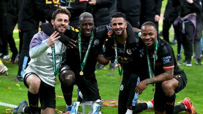 3. Manchester City' - 4102 points. Bernardo Silva, Benjamin Mendy, Riyad Mahrez and Raheem Sterling celebrate after winning the League Cup Final at Wembley Stadium. PA