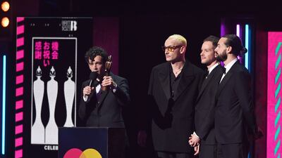 The 1975 with their award for Best Rock/Alternative Act. EPA