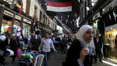 Iranian businessmen are establishing a foothold in Syrian shopping areas. Diaa Hadid / AP Photo