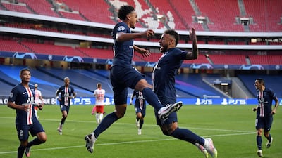 Marquinhos (L) celebrates with Neymar against Leipzig. Getty