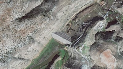 A satellite photo shows the upper dam on Wadi Derna before it collapsed when torrential trains from Storm Daniel caused its reservoir to fill beyond its capacity. Maxar Technologies / AFP