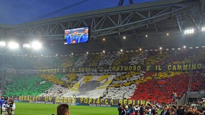 Juventus supporters show their support before Tuesday night's Champions League semi-final first leg against Real Madrid. Andrea Di Marco / EPA