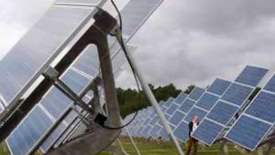 Frederic Conchy, the president of Exosun, checks its solar tracking system. The 126 trackers, follow the sun's path and produce 30 per cent more energy than static solar panels.