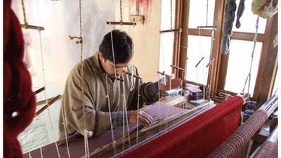Despite mechanised looms increasingly being used by some manufacturers, Srinigar's traditional methods of manually threading the looms can take up to a day and a half, using hand-spun and dyed pashmina wool.