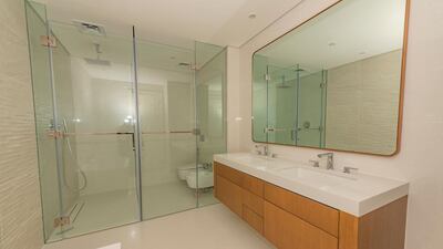 A double vanity and closed off shower. Courtesy Henry Wiltshire